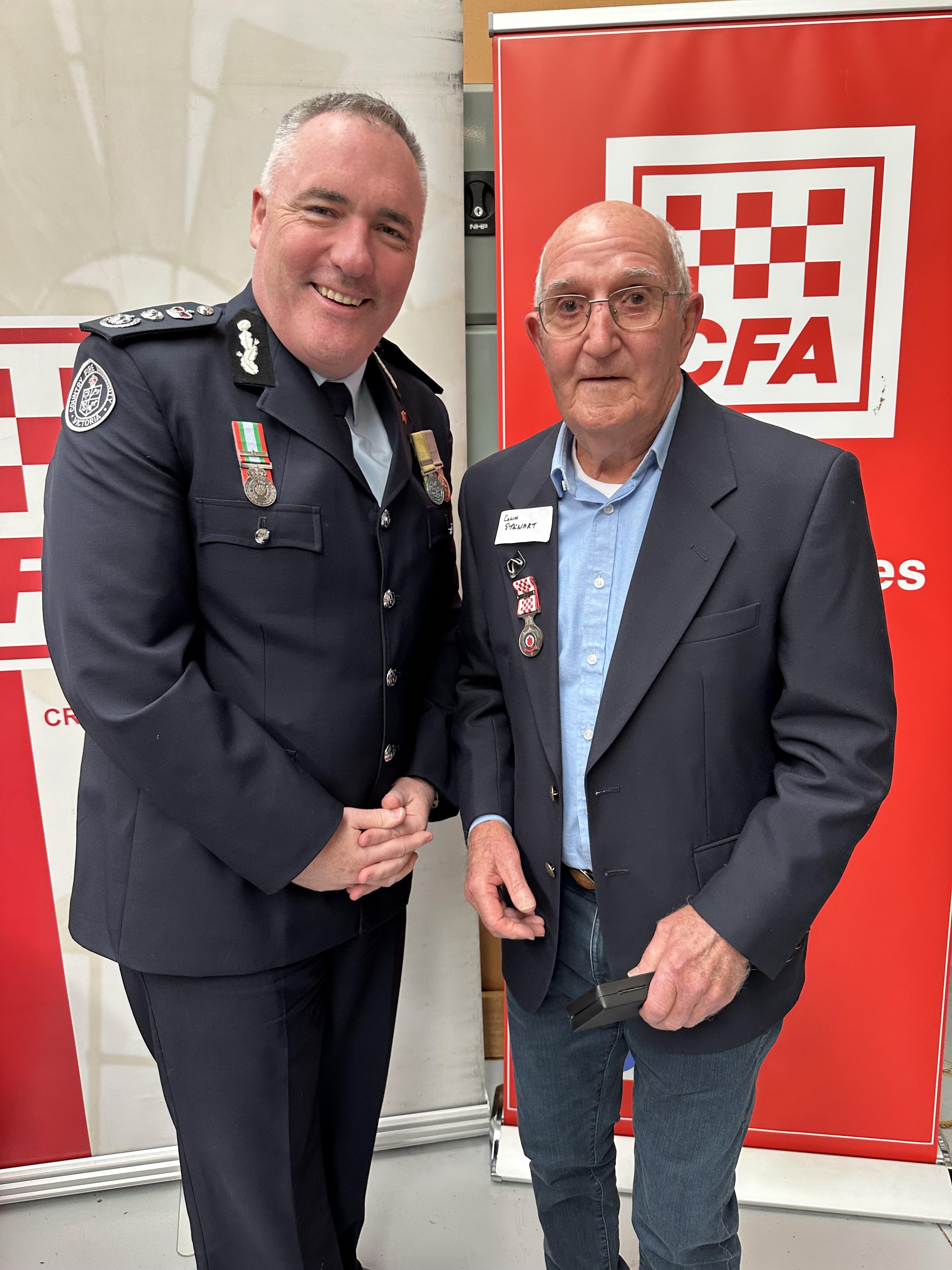 Colin Stewart receiving 65 year service medal